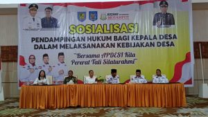 Jusnan C Mokoginta Hadir dan Membuka Sosialisasi Pendidikan Hukum Bagi Kepala Desa