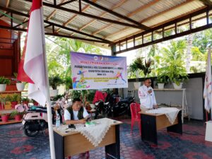 Ketua KONI Touna Aspan Taurenta, S.H, saat memberikan sambutan di Muskab PBVSI , Selasa (13/5)