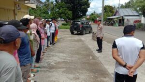 Terima Laporan Warga, Gerak Cepat Polsek Tutuyan Turun Langsung Evakuasi Mayat di Perkebunan Togid
