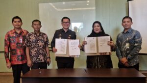 Gambar: Pemkab Minut Berpeluang Raih Paritrana Award 2024, Bupati Joune Ganda Paparkan Komitmen Perlindungan Pekerja, (26/6/2025).