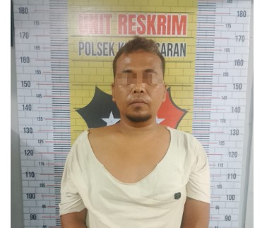 Seorang pria berinisial AM alias Anan alias Kutil (41), warga Desa Rawang V, Kecamatan Rawang Panca Arga, Kabupaten Asahan, diringkus polisi saat diduga tengah bersiap melakukan transaksi narkoba jenis sabu, Senin (21/7/2025). Foto : Doni